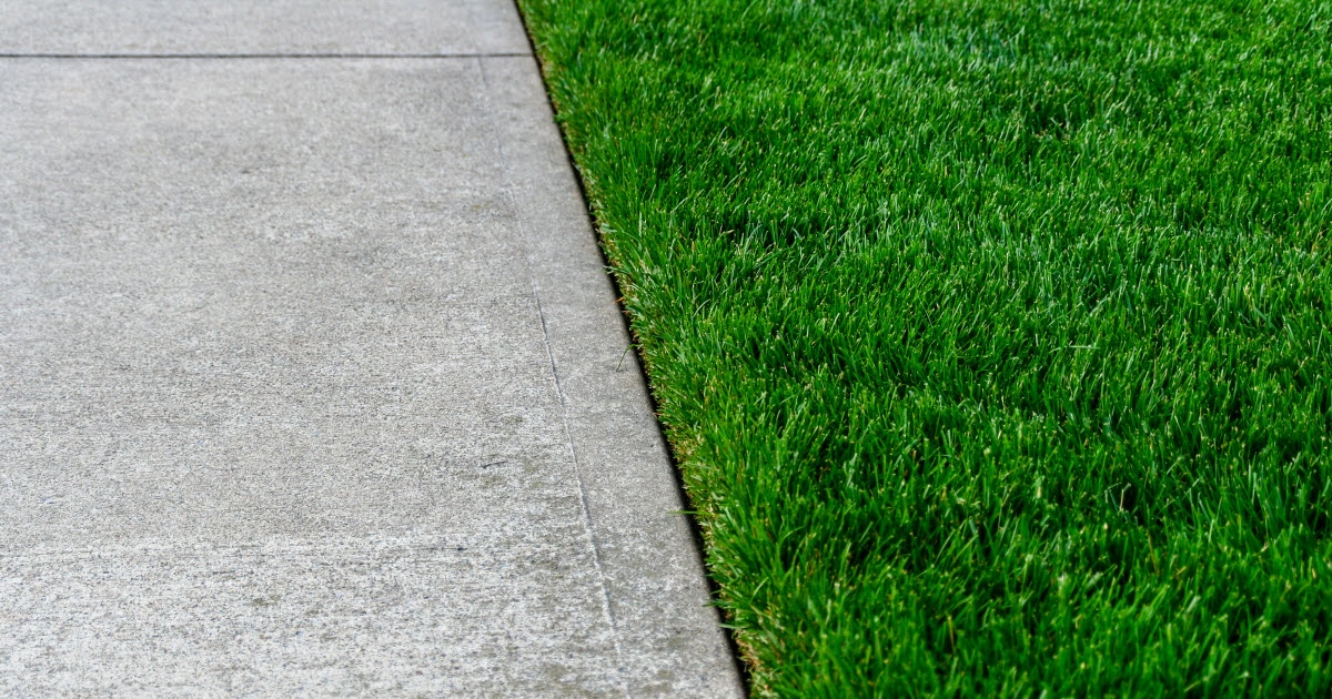 Clean lawn edging during weekly landscape maintenance in Temecula.